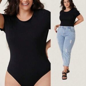 Elegant Black Bodysuit with Stretch Fabric and Seamless Design